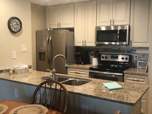 Fridge, microwave, stovetop, dishwasher