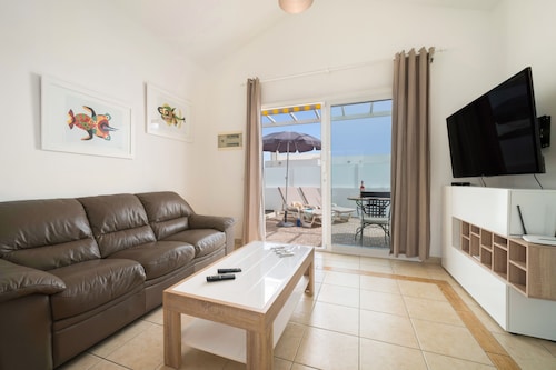 B1, in a small complex with communal pool 100m from the sea