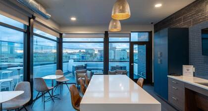 Modern 1BR Apt with Skywalk to Fiserv, Rooftop, and Parking