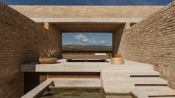 Outdoor pool, pool umbrellas, sun loungers