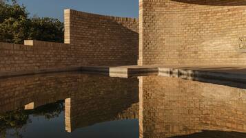 Outdoor pool, pool umbrellas, sun loungers