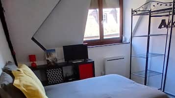 1 chambre, fer et planche à repasser, Wi-Fi gratuit, draps fournis