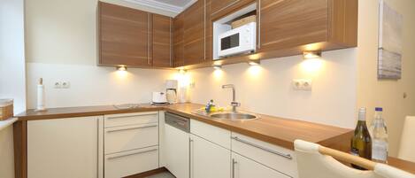 Fridge, microwave, coffee/tea maker, toaster