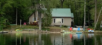 Wonderful house on sandy beach, sports lake close to golf, bike/snowmobile trail