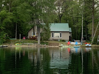 Wonderful house on sandy beach, sports lake close to golf, bike/snowmobile trail