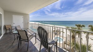 A balcony with a view of the beach and ocean. - Ocean House 1304 | Heated, Zero Entry Pool | Oceanfront Balcony | My Beach Getaways (Gulf Shores)