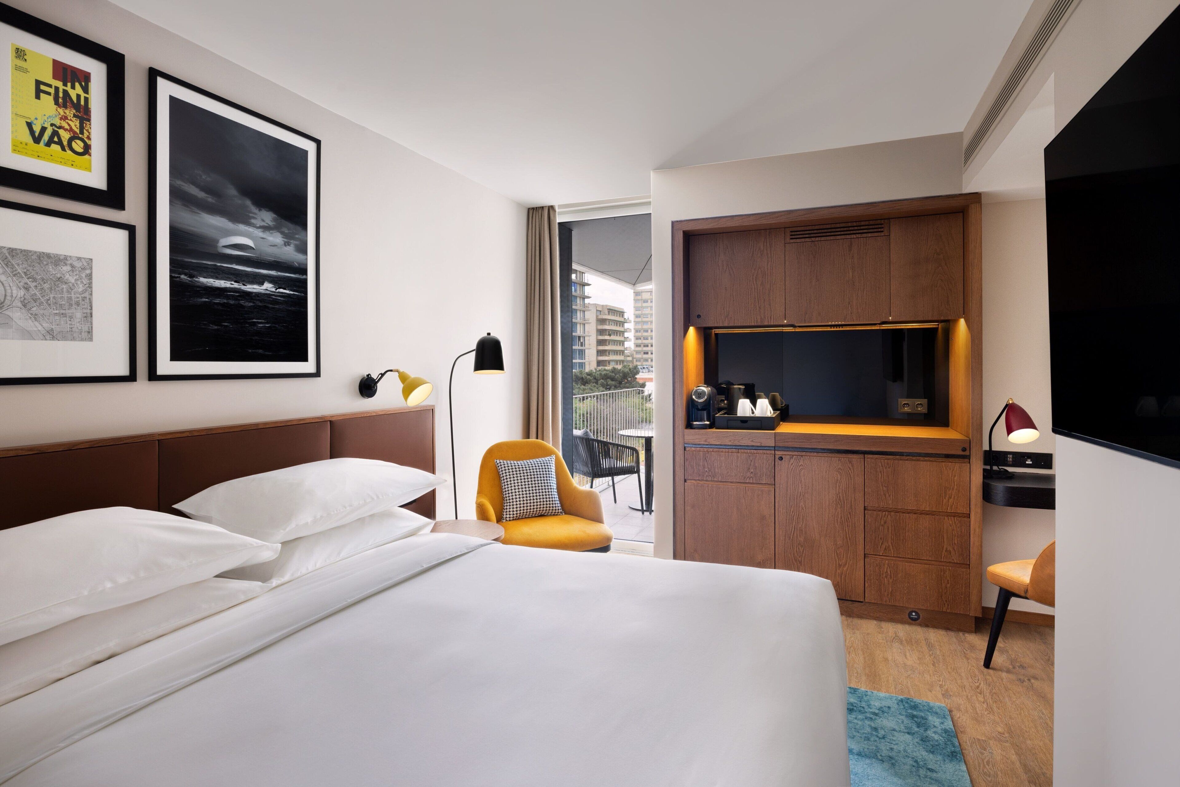 superior room, 1 king bed, balcony, city view | premium bedding, minibar, in-room safe, desk