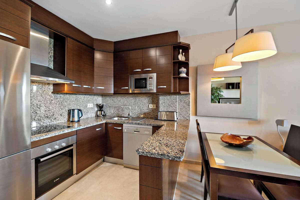 Premium Suite, 1 Bedroom, Hot Tub (Plus) | 2 bedrooms, in-room safe, individually decorated, desk
