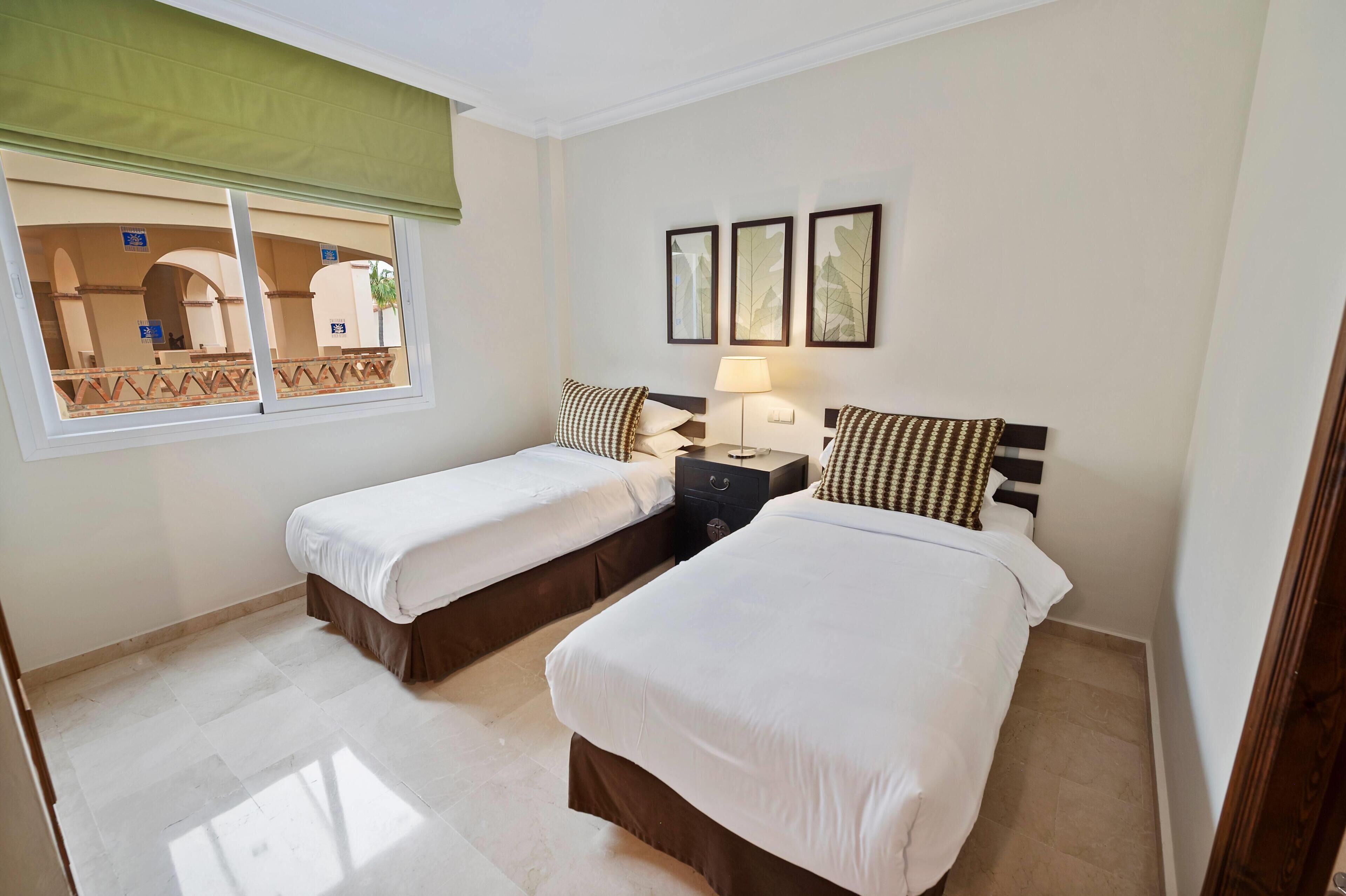 Premium Suite, 3 Bedrooms (Plus) | In-room safe, desk, laptop workspace, iron/ironing board
