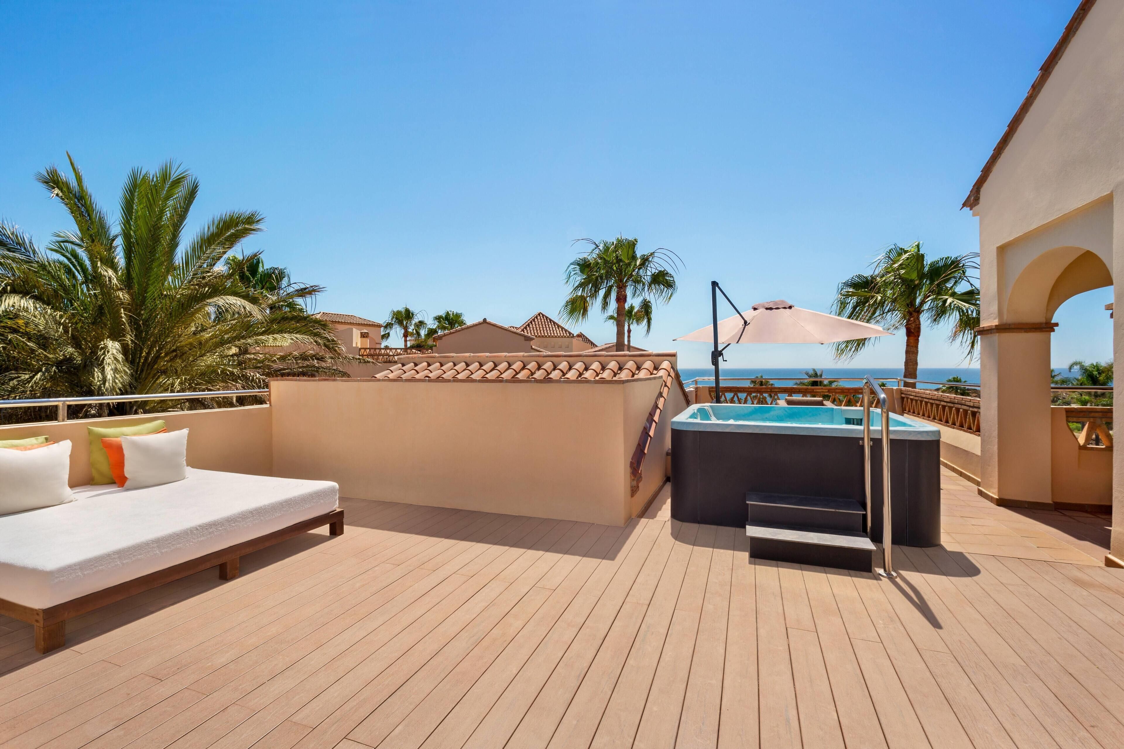 Grand Suite, 3 Bedrooms, Hot Tub, Sea View | In-room safe, desk, laptop workspace, iron/ironing board