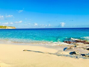 On the beach, sun-loungers, beach towels