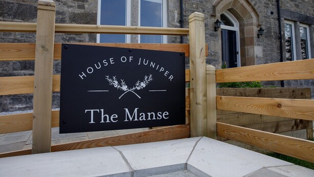 A sign for the House of Juniper The Manse. - House Of Juniper - The Manse (Strath)