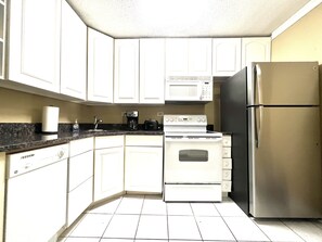 Microwave, dishwasher, coffee/tea maker, toaster