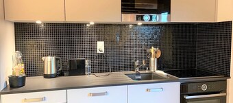 Outside: Apartment for 3 persons on the 4th floor with elevator, balcony with view, shuttle bus stop