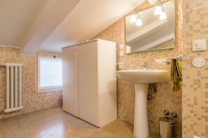 Bathtub, hair dryer, bidet