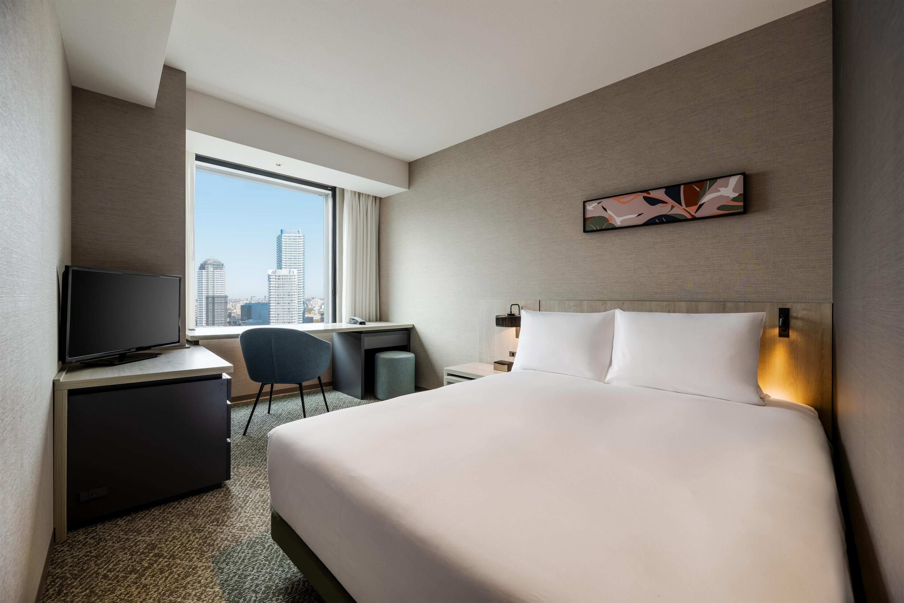 Room, 1 Queen Bed, City View (Guest) | Down comforters, in-room safe, blackout drapes, bed sheets