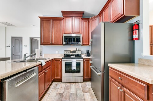 Dog-friendly oasis with central AC, patio & fenced yard - walkable location