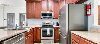 Dog-friendly oasis with central AC, patio & fenced yard - walkable location