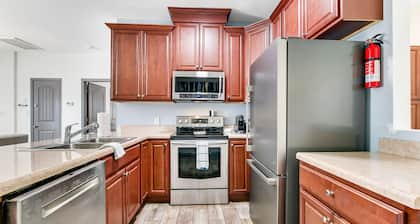 Dog-friendly oasis with central AC, patio & fenced yard - walkable location