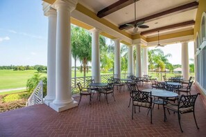 Outdoor dining - Luxury 4BR Disney Dream Home - Resort Style Amenities | 15 Miles to Disney World (Davenport)
