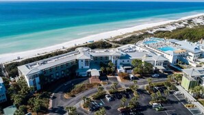 A resort with a pool, beachfront view, and multiple buildings. - WaterColor-Santa Rosa.  Golf Cart, 2 min from beach, Community Pools (Santa Rosa Beach)