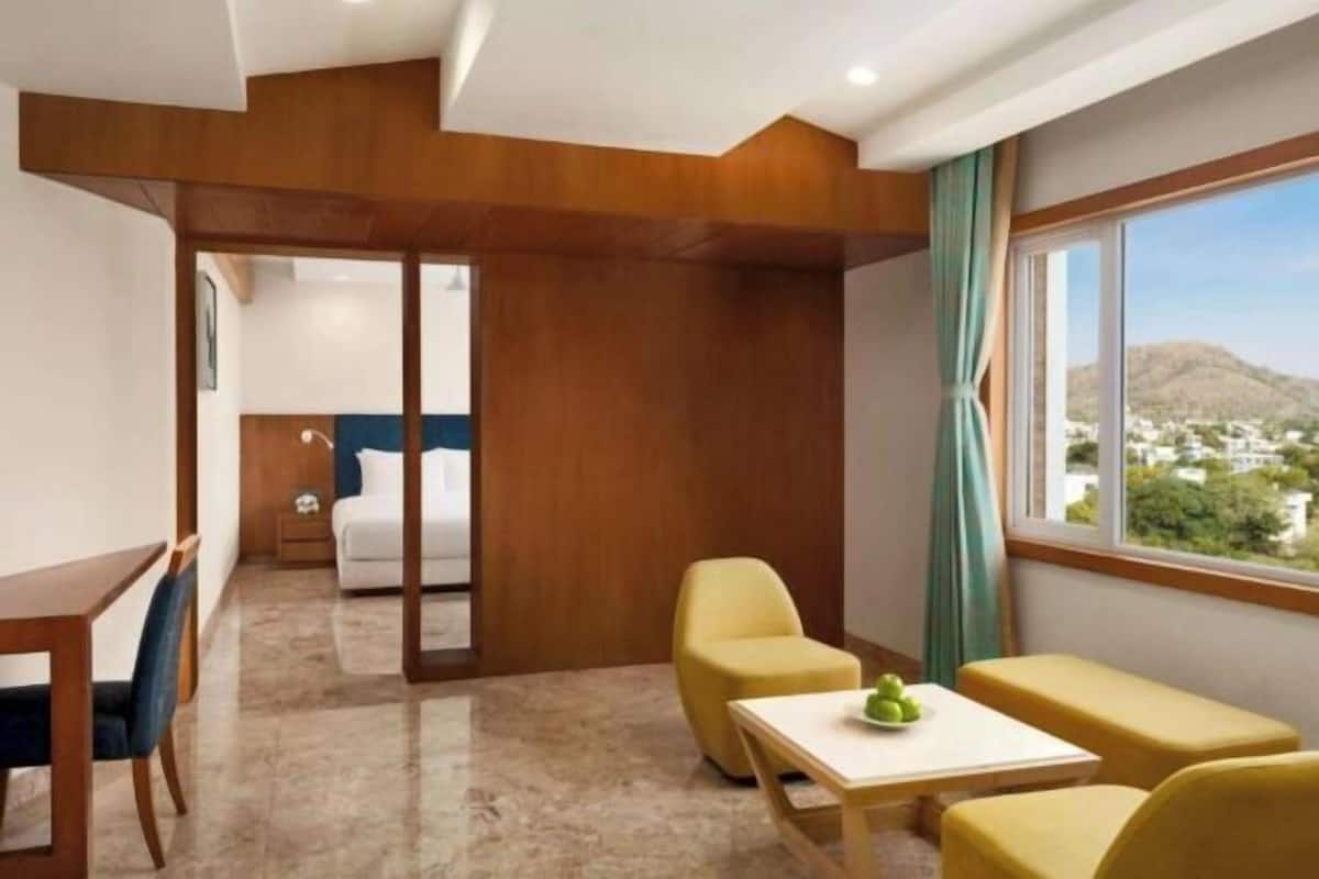 Premium bedding, memory foam beds, minibar, in-room safe