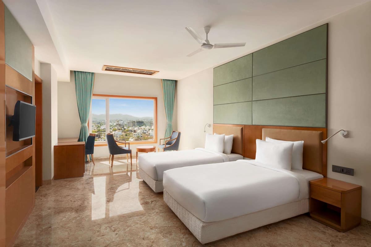 Biancheria da letto di alta qualità, materassi in memory foam, minibar