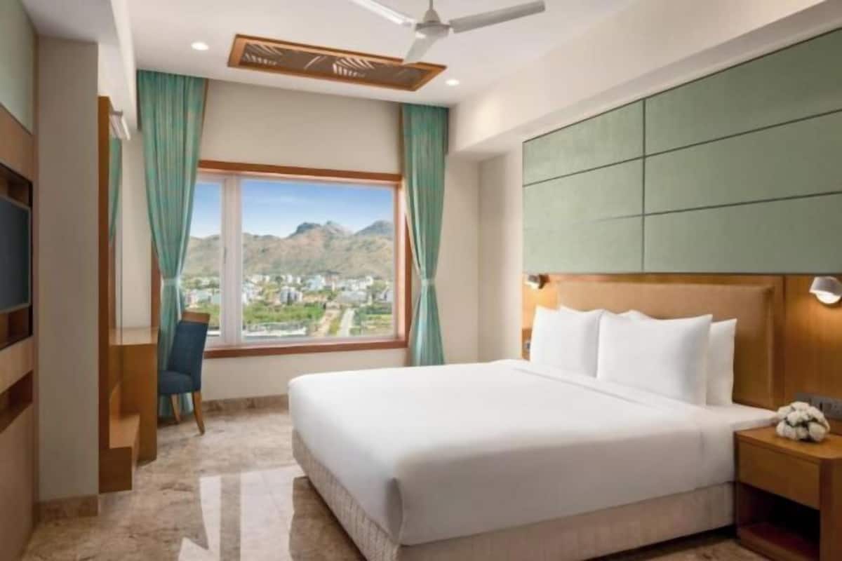 Premium bedding, memory foam beds, minibar, in-room safe