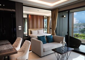 Family Condo (D4407) | Living area | Flat-screen TV - Panora Phuket Condominium (Choeng Thale)