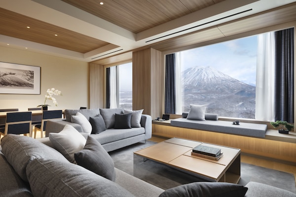 Three Bedroom Yotei Suite, Non Smoking | Living area | Flat-screen TV, heated floors