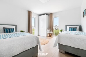 3 quartos, escrivaninha, berço de viagem, Wi-Fi de cortesia