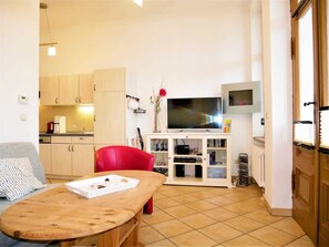 Fernseher, Kamin