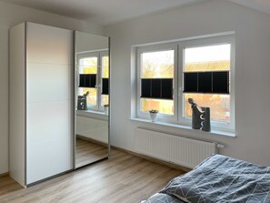 1 bedroom, travel crib, WiFi, bed sheets