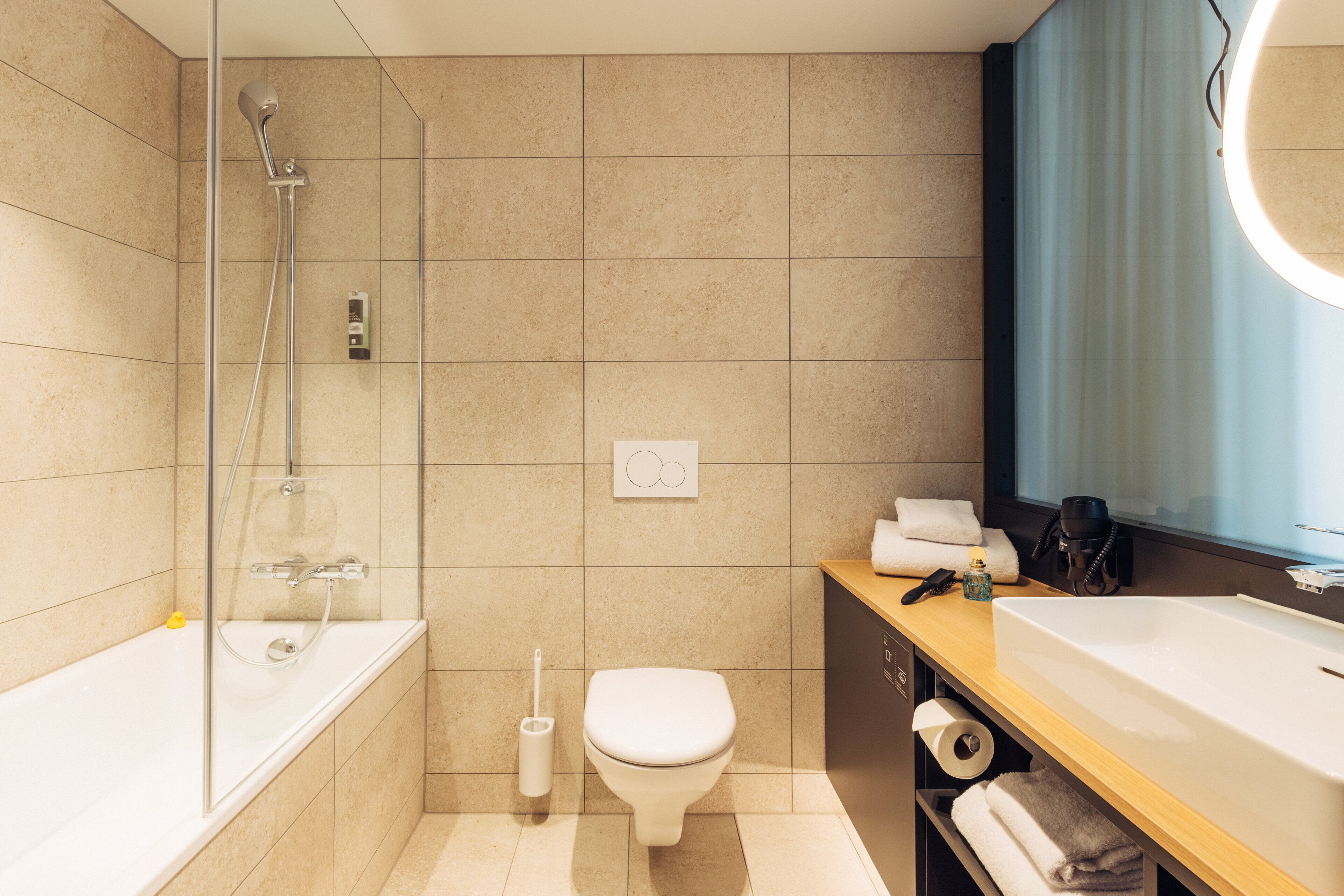 family apartment | bathroom | eco-friendly toiletries, hair dryer, towels, soap