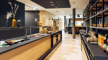Daily buffet breakfast (CHF 23 per person)