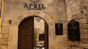 A stone archway with the name "APRIL LUXURY SUITES" and a sign indicating room number 17. - April Medieval Hotel (Rhodes)
