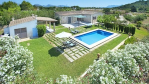 A residential property with a swimming pool, a covered patio, and a garden. - VILLA PENASO - PRIVATE POOL AND HEAVENLY GARDEN (Pollensa)