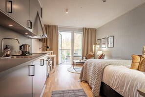 Superior Studio | Hypo-allergenic bedding, desk, blackout drapes, soundproofing