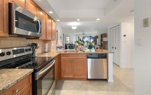 Fridge, microwave, oven, stovetop - Beachfront 2BR/2BA condo with pool, wifi, and balcony on Marco Island. (Marco Island)
