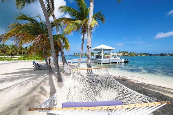 On the beach, sun-loungers, beach towels