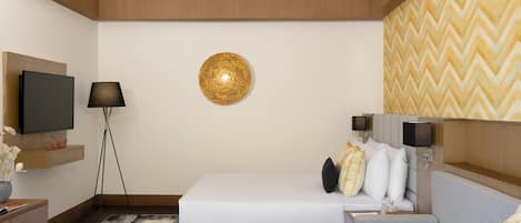 A modern hotel room with a bed, a sofa, a TV, a lamp, and a decorative wall piece.