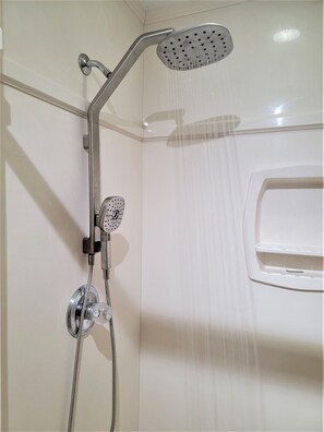 Shower, towels, toilet paper