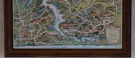 A framed map of Smith Mountain Lake, VA, depicting various buildings, roads, and landmarks.