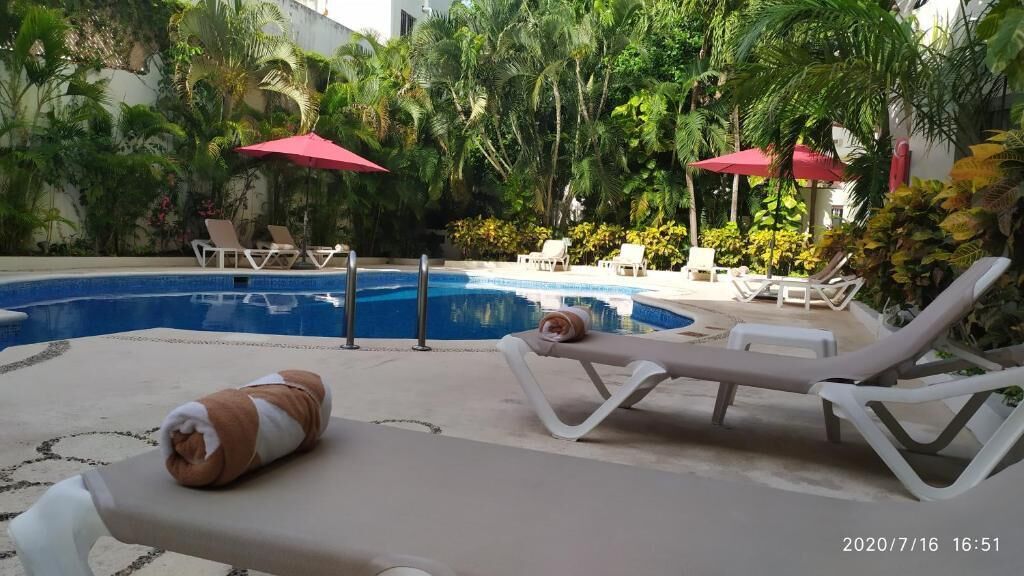 outdoor pool, pool loungers