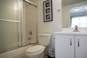 Bathtub, hair dryer, towels