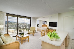 Enjoy a city view from the balcony, relax in the seating area, and unwind in the comfortable bed.