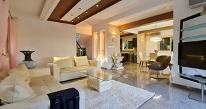Villa, Multiple Beds | Living room | 30-inch TV with cable channels, fireplace - Stunning 5-bed Beach Front Villa, Private Beach (Mazotos)