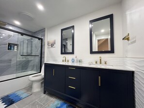 Combined shower/tub