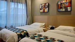 A hotel room with two beds, a large window with curtains, and two pieces of wall art. - Shell Shanghai New International Expo Center Fanghua Road Metro Station Hotel (Shanghai)