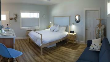 1 habitación, tabla de planchar con plancha y cuna de viaje